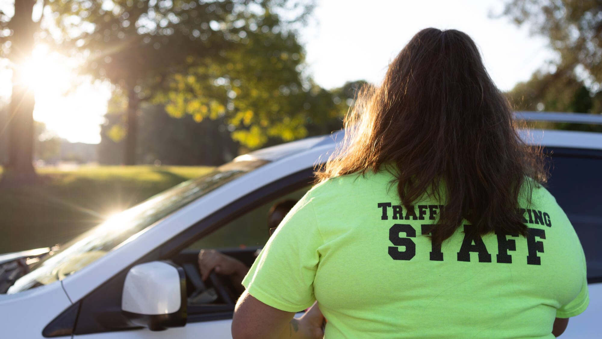 parking staff greeting a move in car